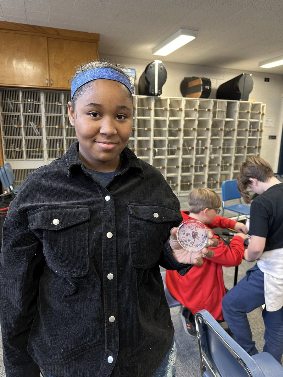 Instead of candy to celebrate a successful concert, we are having a creative experience together.  Images on plastic lids represents our time together.  After I shrink the plastic, it will be a charm.  When they see it years from now, it will trigger that amazing memory.