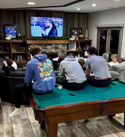 STMA boys varsity basketball team enjoying a (k)night of food,fun,and bonding time! Thanks so much to the Jans family for hosting the team!!