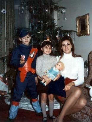 "Raquel Welch with her children, Christmas, circa the mid-'60s.  One of the preeminent pin-ups of the Vietnam Era, Twentieth Century Fox was intent on concealing the fact that she was a working single mother of two."