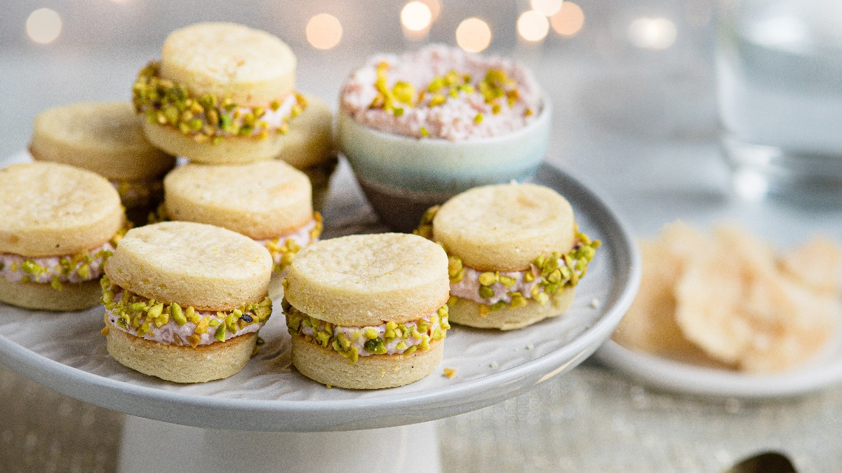 Break out of your cooking comfort zone with this #ParmigianoReggiano cheese sable biscuits with mortadella and pistachio mousse!