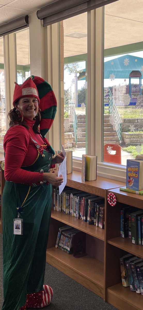 I had an elf <a href="/SREStallions/">SRE Stallions</a> come decorate the library windows today  ❄️ ❤️ ❄️