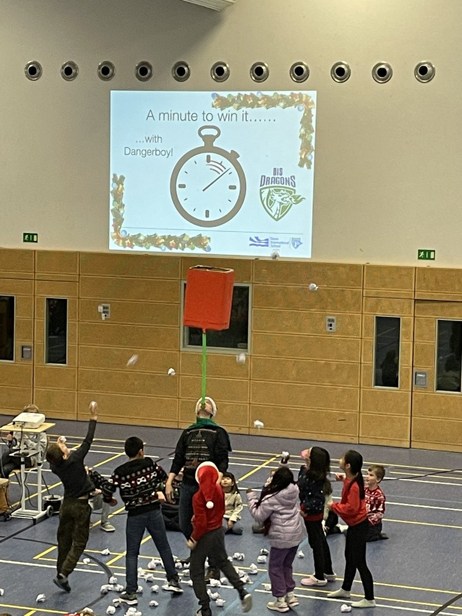 Drrobertsims's tweet photo. Elementary assembly at Bonn International School and a minute to win it with Mr. Whitaker. #BonnIS #HappyHolidays https://t.co/TlyOl6yl9a