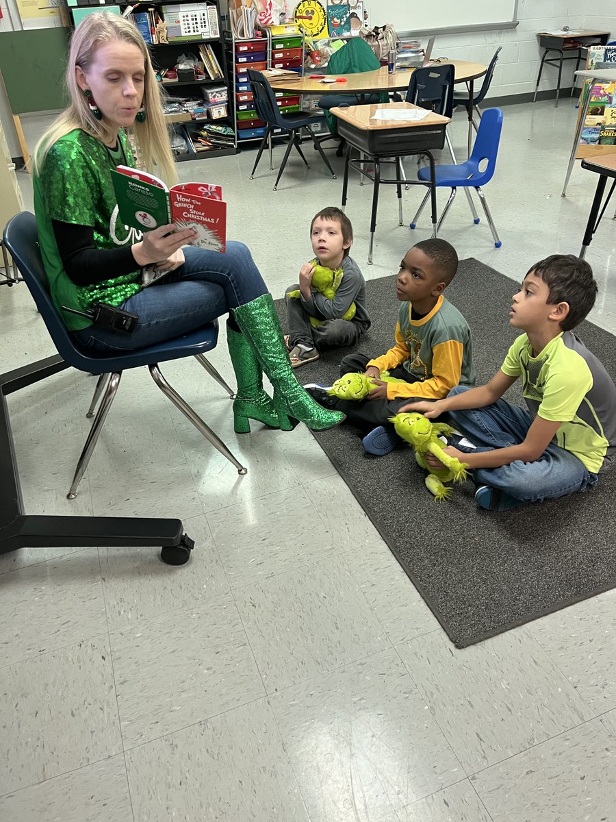 GreatDayatSJ's tweet photo. Ms. Sibcy’s students celebrated grinch day together. Each student received a grinch reading buddy with the book How the Grinch Stole Christmas. The class read the story together and then completed some literacy activities. #greatdayatsj #successatjcss https://t.co/18M153oPIU