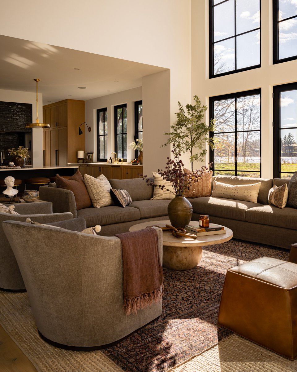Westofmain's tweet photo. Say hello to the living room at #ProjectNewHouseOldCharm 
This is truly the heart of the home. With statement floor-to-ceiling windows, a hand-chiseled fire place, and views of the water, this space automatically draws you in from every angle 🤎 https://t.co/ha3UMSa3Br