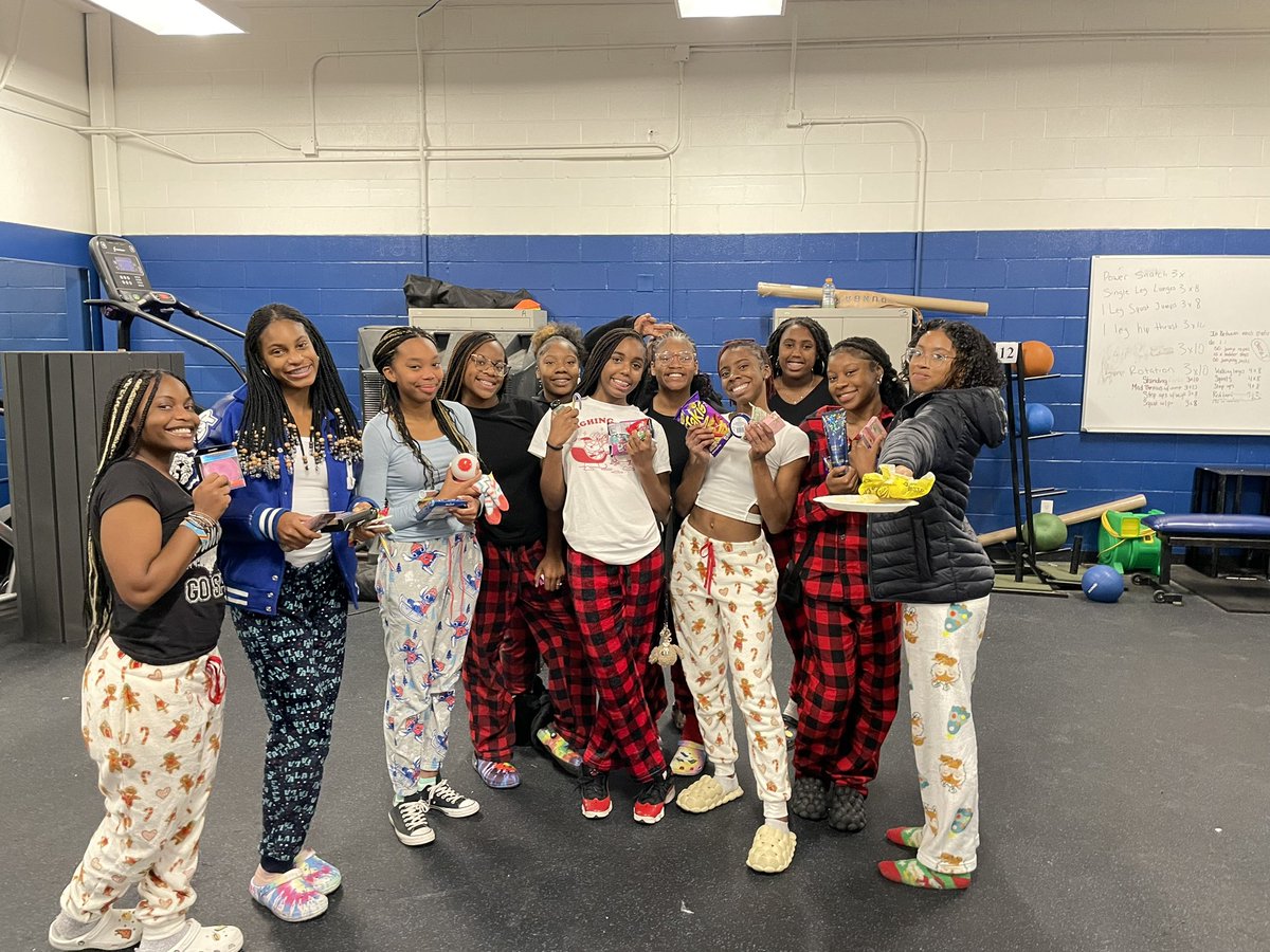 Gingerbread House winners🥇. Gingerbread House losers…they tried 😂. Saran Wrap Game gift smiles. Merry Christmas and Happy New Year from the Lady Wildcats!
