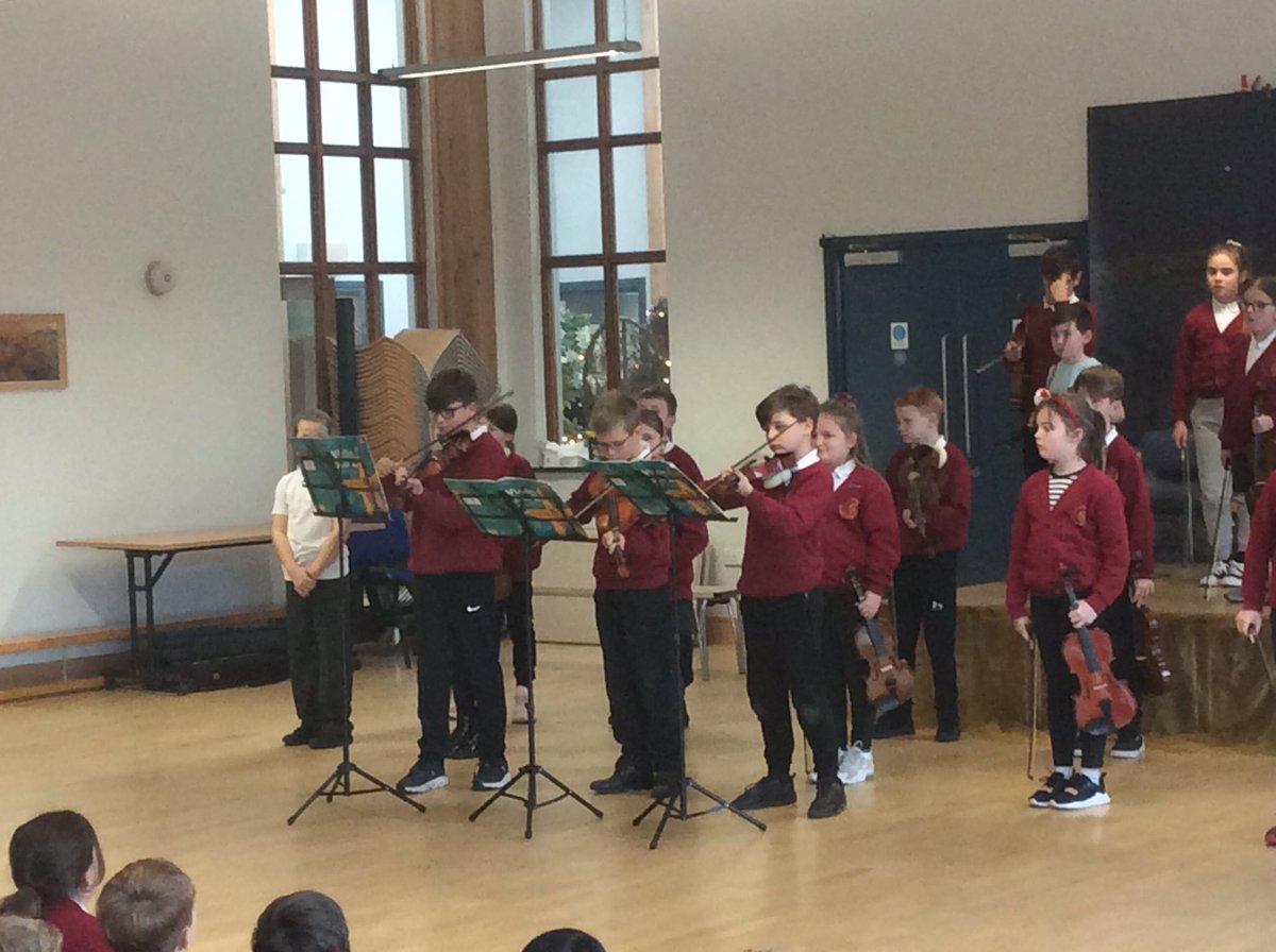 StMary_ofAngels's tweet photo. What a wonderful end to the week and term of music learning. Our Year 5 concert was a hit and the children played beautifully. Thanks to Miss Sherwood @MusicalRoutes and our Year 6 participants who have continued with their tuition this year 🎵 🎄🎻 https://t.co/mEPJgs2PMR