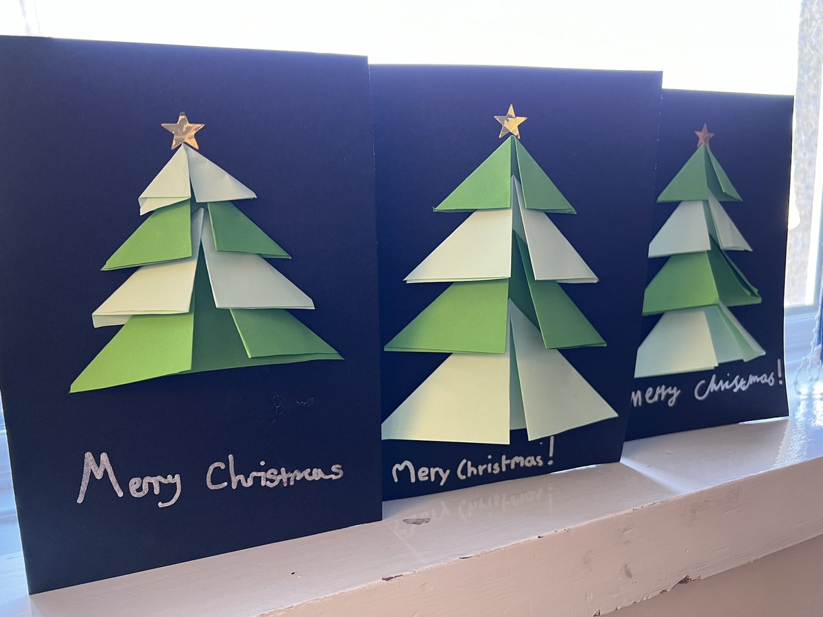 primaryteachew's tweet photo. A child in my class brought in a card she’d made using this design earlier in the week, so today she taught the whole class how to make them! It was such a lovely last day activity🎄✨ https://t.co/MbofwgduPz
