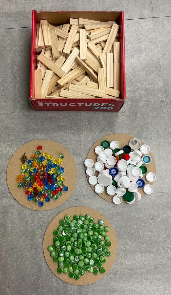 kcce_yr's tweet photo. Loose parts Christmas Tree created by the school age children at Kids Connection @ Beckett Farm using wooden blocks, various gemstones, bottle cups, and mini crystal leaves. 
#KCCE #yorkregion #playbaselearning #earlylearning #stem  #looseparts #gems #woodensticks https://t.co/iLoL9AGILO