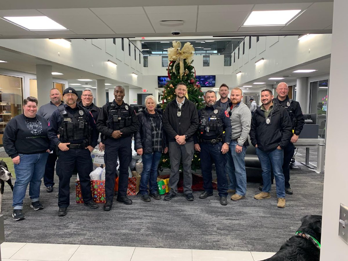 GIPoliceDept's tweet photo. Thank you AMUR and CASE IH for all of the great #SantaCop donations! https://t.co/eEXwMKlU9i
