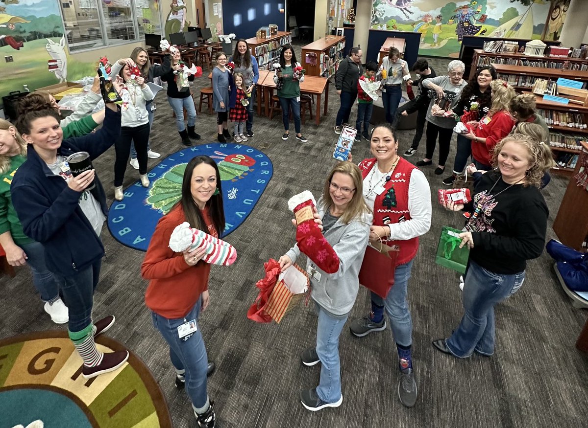WarnerCFISD's tweet photo. On the last day before break we had our Warner staff sock exchange! #12Daysbeforebreak #TistheSeason https://t.co/iNYZtw4ezC