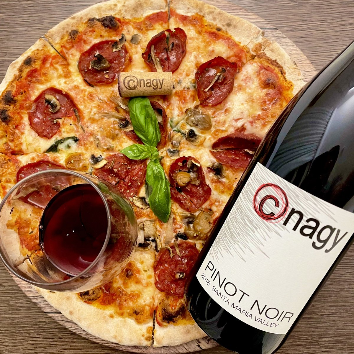 #PizzaFriday fun with a <a href="/cnagywines/">Clarissa Nagy</a> pinot noir from <a href="/VisitSMV/">Santa Maria Valley</a>. This one has a nose of blackberry, rose petal and white pepper with tastes of ripe red plum, bay leaf and sandalwood.  Check out Clarissa’s lineup of wines through the link in her bio. Cheers. <a href="/boozychef/">boozychef</a> <a href="/jflorez/">Joe Florez</a>