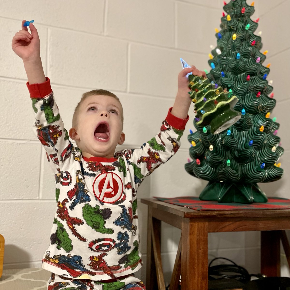 JonDech's tweet image. This kid is LOVING Christmas decorations this year. He has always liked the "twinkle lights" that come out this time of year. But this year he is really excited about Christmas trees. Thanks Uncle Michael and Great Grandma for the ceramic trees--they're obviously a hit!