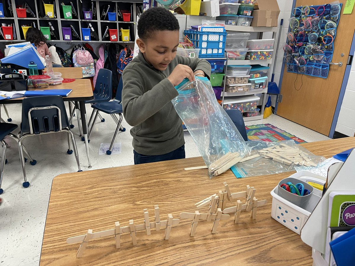 “Help! Help!”,cried the gingerbread man. “I can’t get across the river.” Using only craft sticks and clothespins, 1st graders used their engineering skills to build a way to help the gingerbread man. We had boats, bridges and stilts. Creative minds at work. <a href="/SwansCreekES/">Swans Creek Elem</a>