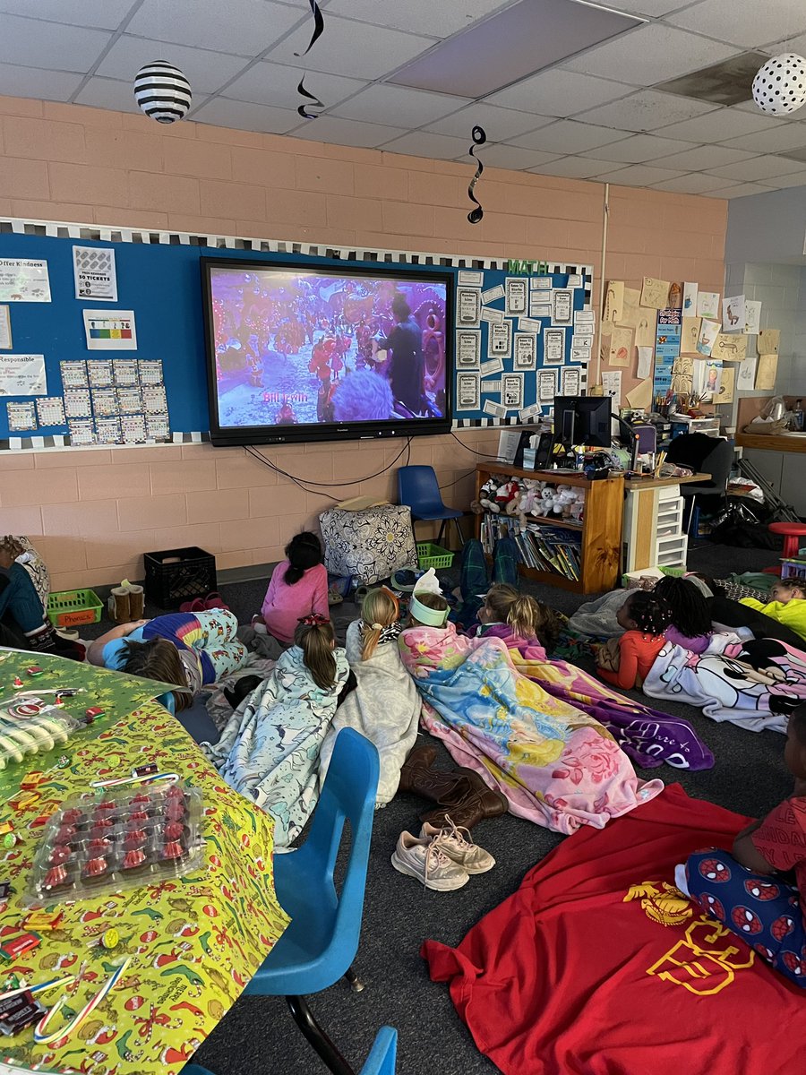 msahanson's tweet photo. Ms. Hanson’s class had the grinchiest day! Grinch snacks, grinch movie, grinch hats, grinch slime, grinch math and grinch writing. We even had a visit from the Grinch themselves! We also exchanged our secret Santa gofts. @YESjrjags #2ndgradejrjagsrock @FCSchoolsNC https://t.co/3GYXVqGoeu