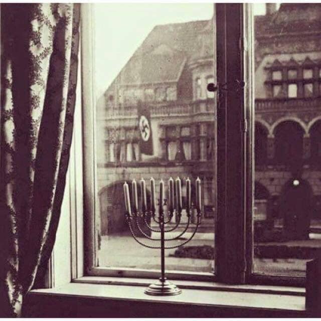 DanielMillerEsq's tweet photo. This photo always takes my breath away, taken in Germany during Hanukkah 1931. 

On the back of the photo Rachel Posner wrote this of her family menorah:

 Chanukah 5692
"Death to Judah"
So the flag says
"Judah will live forever"
So the light answers
https://t.co/aereISelNC https://t.co/ZtMAtMIJYq