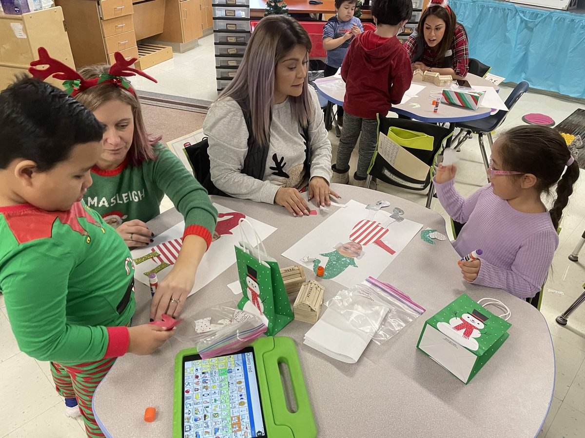 An Elf Extravaganza during Language Motor Group today! Through the icicle tunnel &amp; across the sea of twirly swirly gumdrops to gather elf outfits and become elves! Thanks <a href="/DrNickSutton/">Dr. Nick Sutton</a> and <a href="/Janet_Diaz4/">Janet Diaz</a> for going on the adventure with us! #ASD4ALL @MissReeceSLP <a href="/MrsDregerOT/">MrsDregerOT</a>