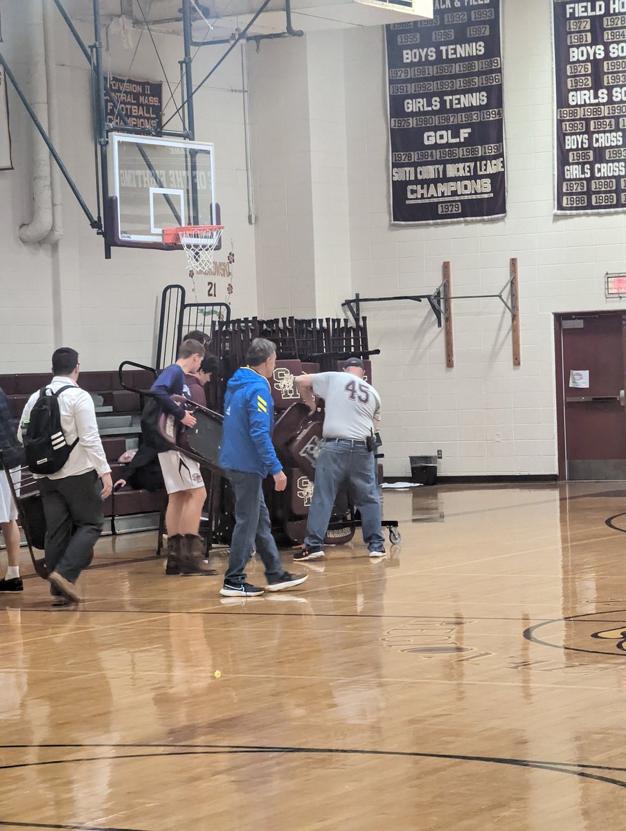 Moments after winning an overtime thriller against Nashoba, The varsity boys squad starters and captains included make sure they helped the custodial staff break down tonight's game. <a href="/SHRamsAthletics/">Shepherd Hill Athletics</a>