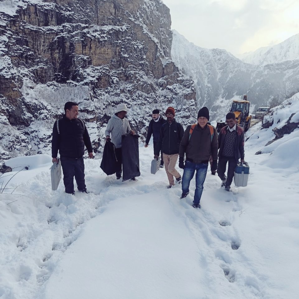 Election officials carrying polling materials in a snow-clad region. 

Caption This Photo! 📸
Frame an interesting caption &amp; send your comments by Thursday. Get a chance to get featured on our page!

#CaptionContest #ElectionCommission #ECI #EveryVoteMatters