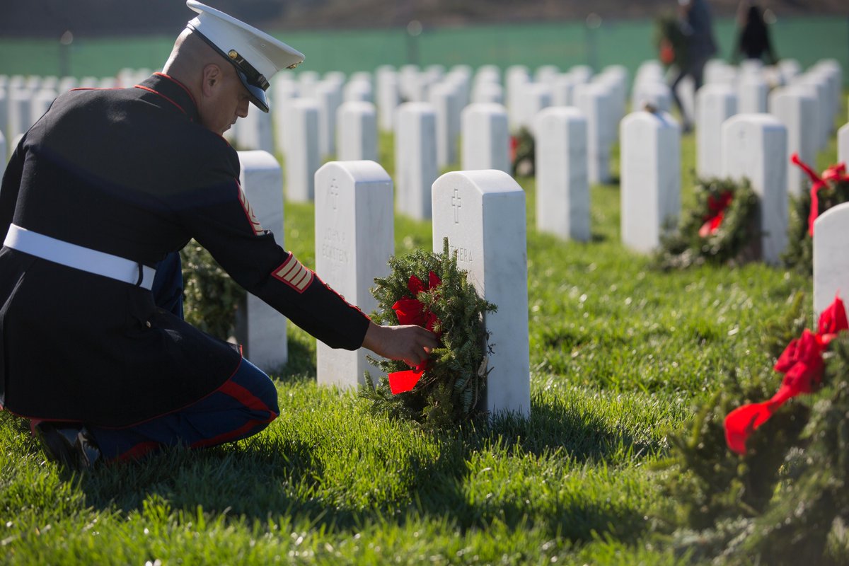 DeptofWar's tweet photo. Today is National Wreaths Across America Day. Across the nation, at sea and abroad, Americans from all walks of life will honor our fallen service members by laying wreaths at more than 3,400 locations.  
Through you, their memory lives on. 
#WreathsAcrossAmerica https://t.co/uA35hPmg41