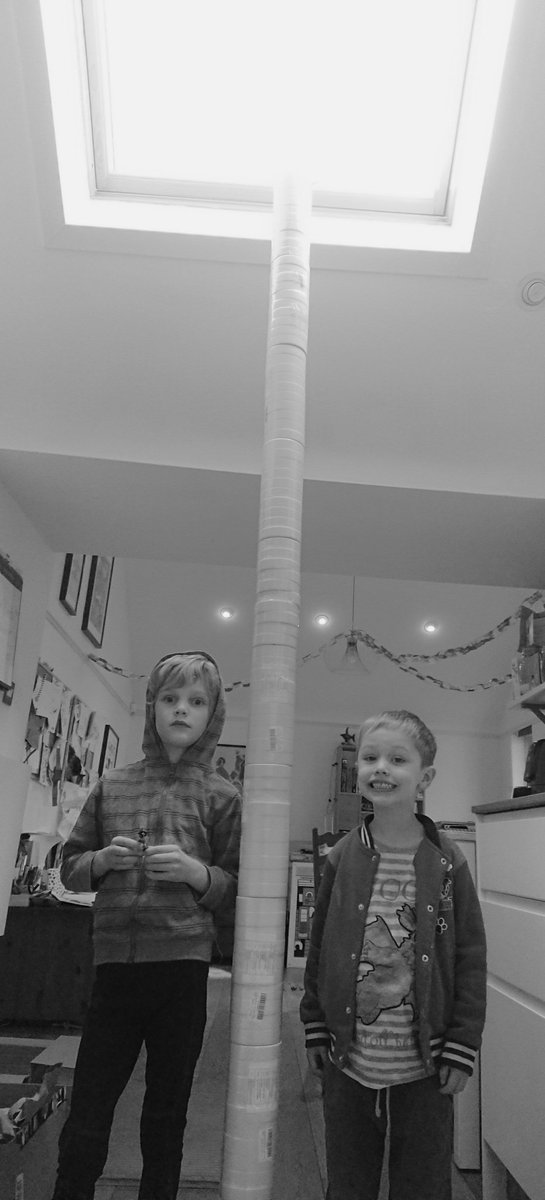 Some supplies for story-linked activity boxes arrived this morning and we saw how tall a tower we could build