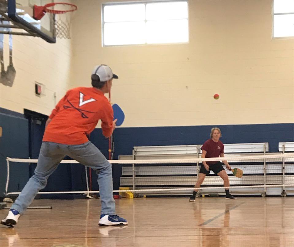 Arrington_PE's tweet photo. Bobby and Wyatt playing an intense game of pickleball. #genzPE @mcpsMCHS @awheeler_wheels @vahperd #secphysed #pickleball  #SportEdModel @MCPSk12 these tweets are created by students as part of the GenZPE model,  Ss is their teams #marketing role https://t.co/VnwhWbQHQd