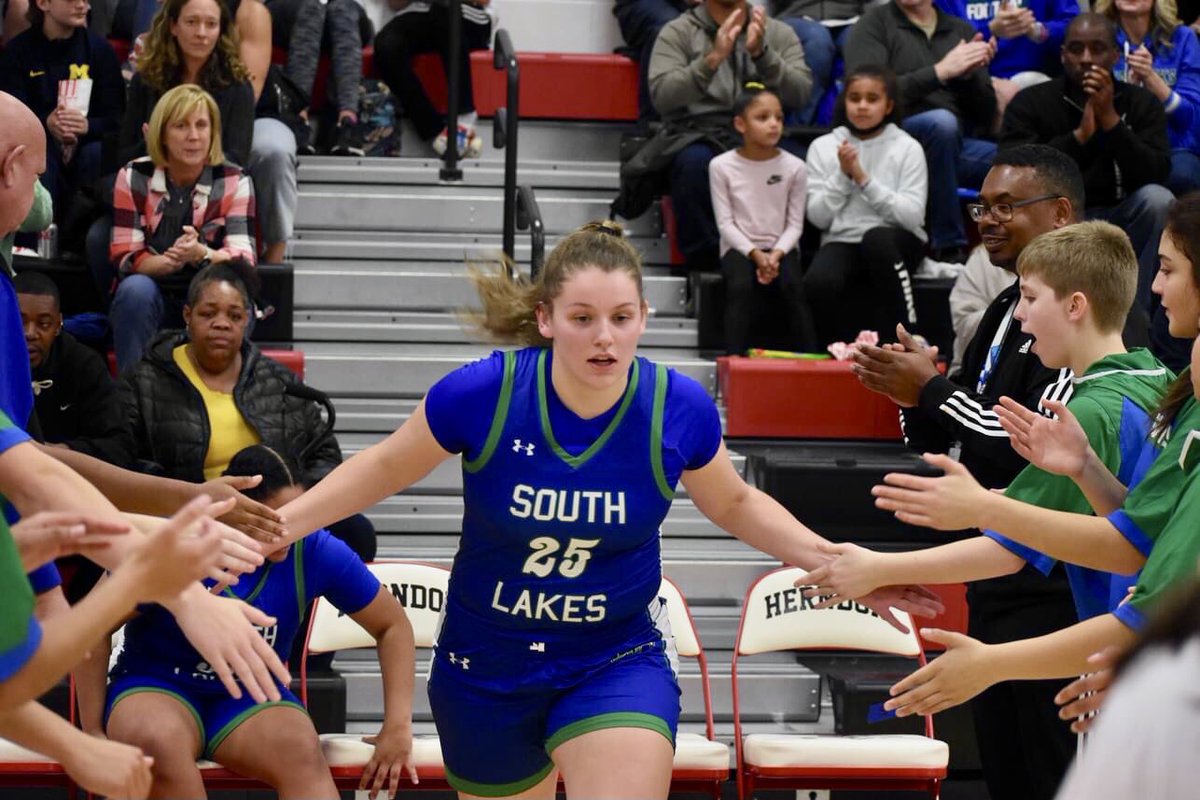 LaurieDornak's tweet photo. Love this Wheaton photo bomb of Coach! 😉💚💙💕#25squad @southlakes_gbb @JessicaDornak50 and thank you for the photos Reggie Copeland! #seahawkproud💚💙 https://t.co/cItNJLCdjF