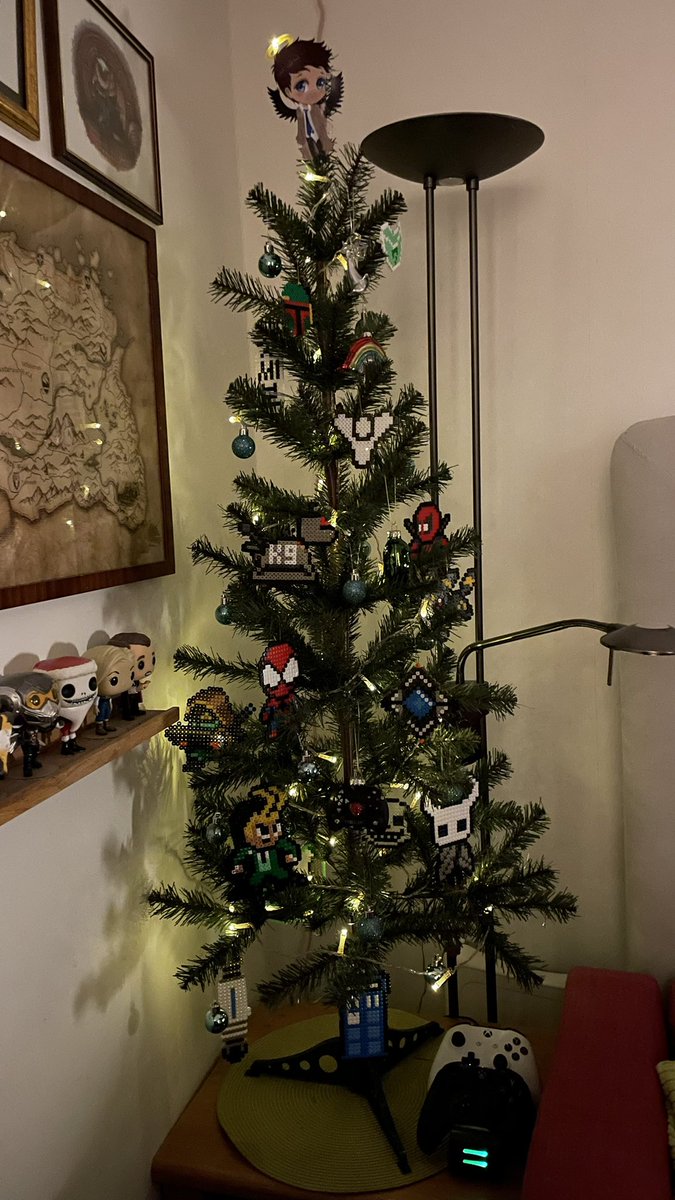 xPickles77x's tweet photo. Finally put up our very nerdy little Christmas tree today. In this house we geek hard! 😁👍
The #hamabead ornaments are made by me and the kids and represent a lot of the nerdy things we like 😊 https://t.co/eZYI2WbNsP