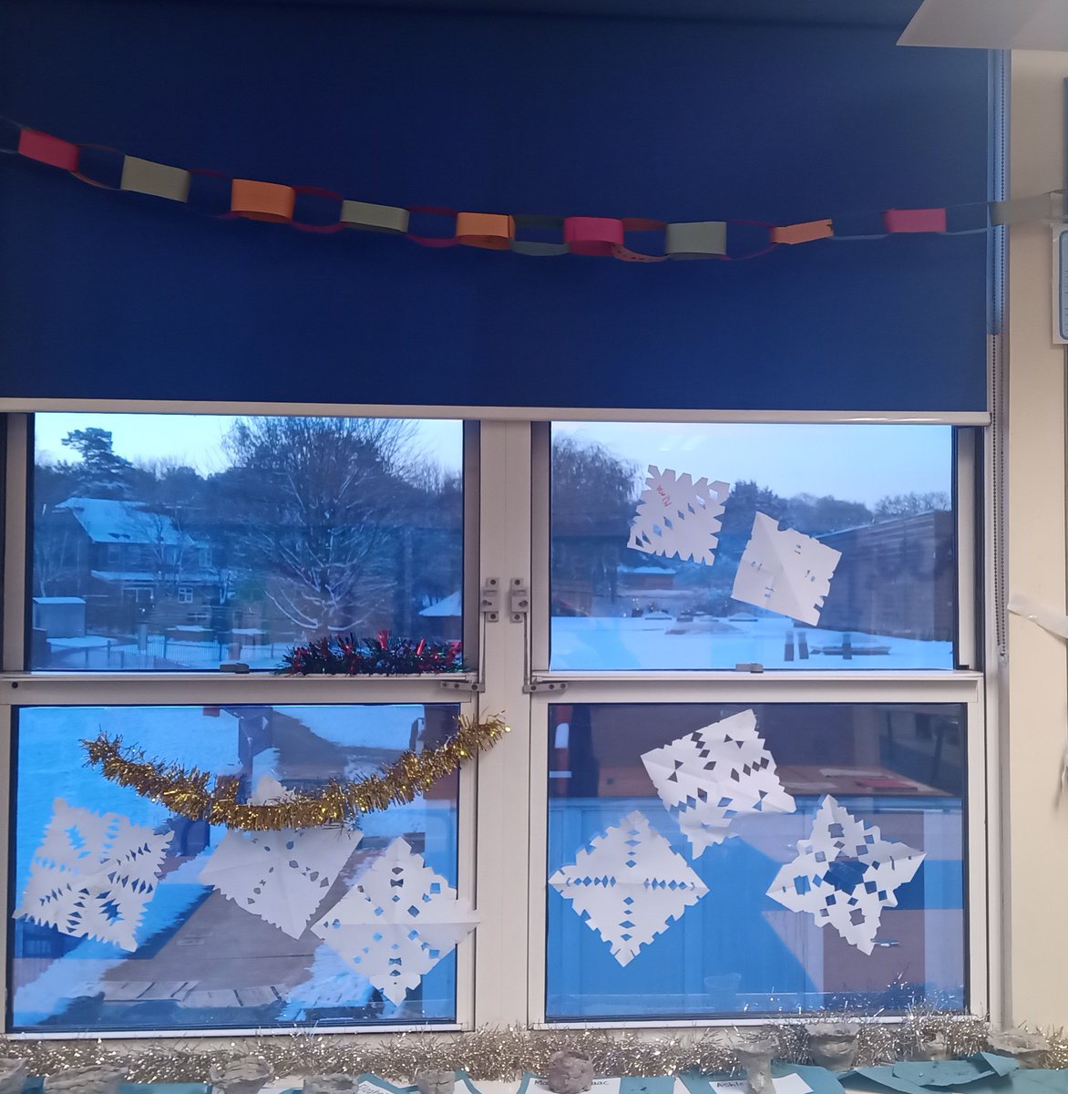 MissAliSPS's tweet photo. Christmas has arrived in 3Wicks. The children have made a class paper chain and snowflakes just in time for the snow. Our postbox is already full of Christmas cards. #SummerswoodPS https://t.co/VWaNiEaAGf
