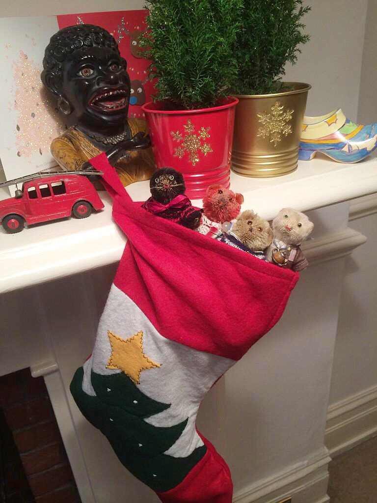 Testing our Christmas stocking for weight, not that we're greedy, we'll share our sweeties, chocolate and nuts with others