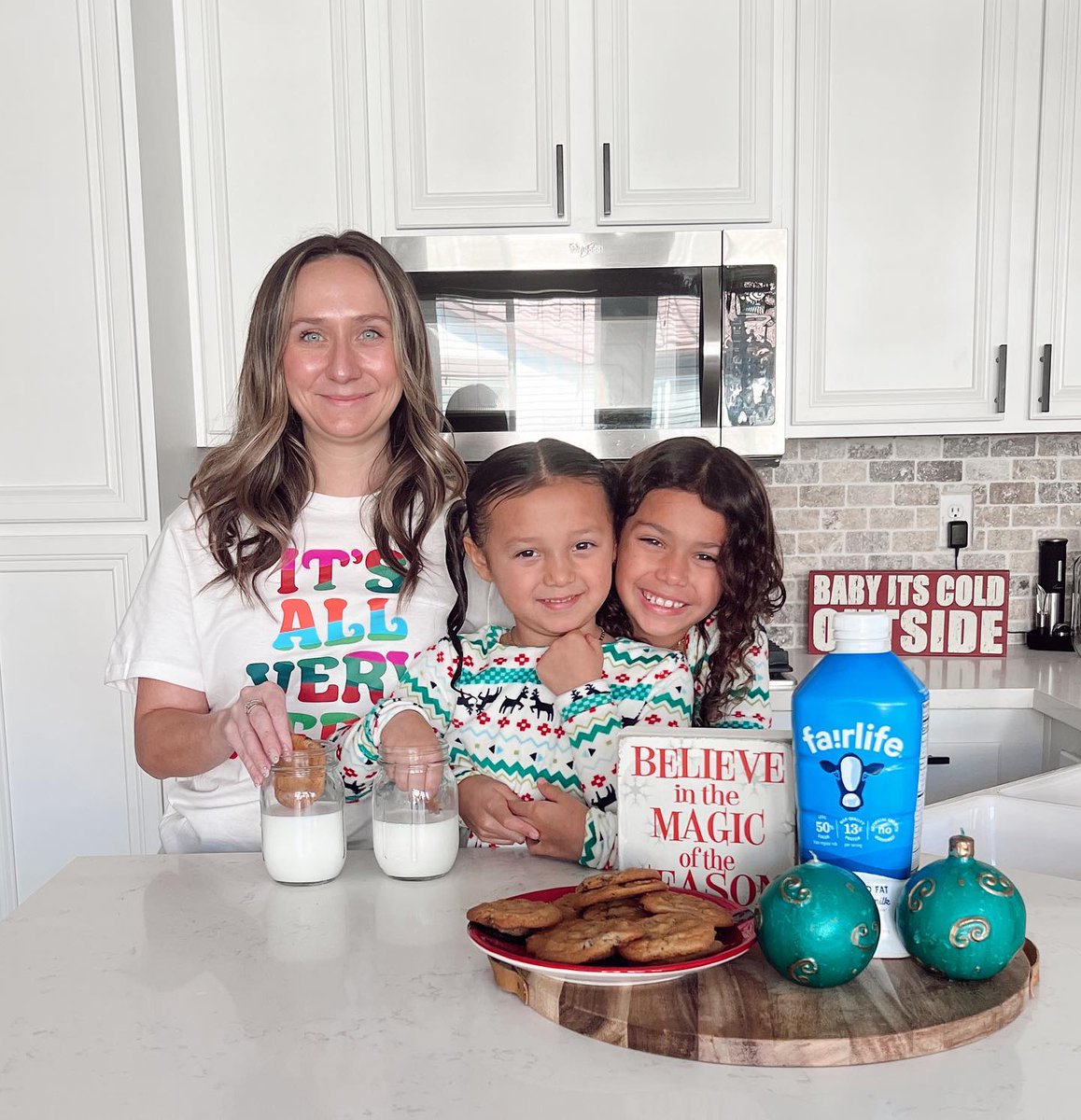 📷 by aly.andco on IG: The girls have been perfecting their baking skills for Santa and enjoying our cookies with @fairlife ultra-filtered milk. #ad It’s creamy and made with 50% more protein and 50% less sugar than regular milk, making it the perfect pairing for milk & cookies!