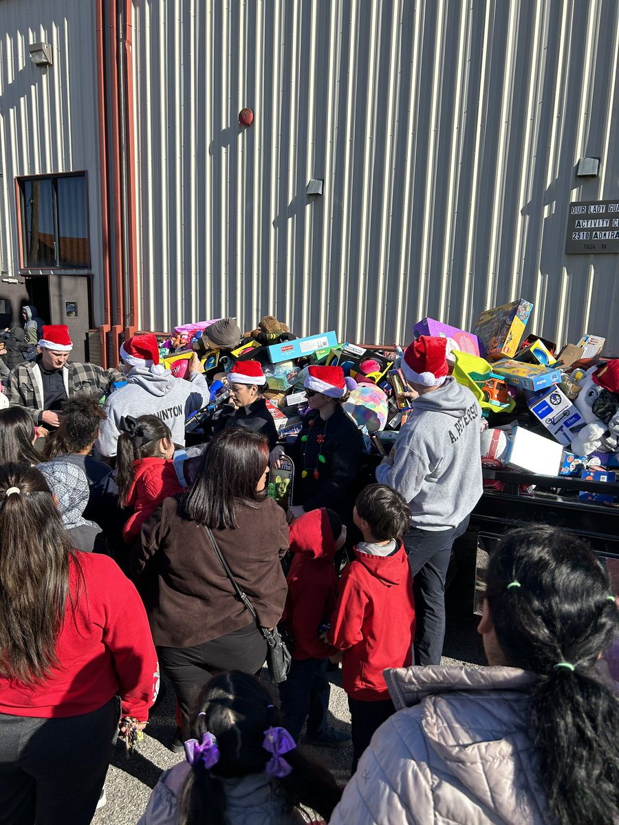 TPDMarkJr's tweet photo. @TulsaPolice Class 124 experienced the value of community engagement this week. Started with buying toys and ended today at the Council For Safe Neighborhoods Christmas event, connecting LE with kids in the Hispanic community. Thanks to Vicente Ruiz, @QueBuenaTulsa and many more. https://t.co/1aocGwHNHv