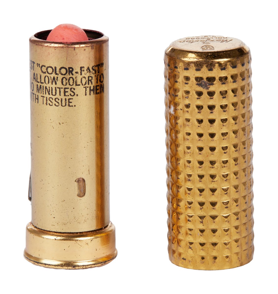 Sold for 12,800. A goldtone metal lipstick tube that personally