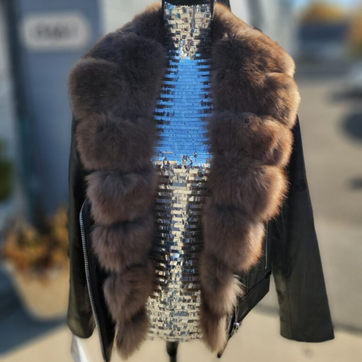elmarfurs's tweet photo. You're sure to make a grand entrance at any holiday party when you arrive in this black moto leather jacket with a sable fox collar.  #CozyAndChic #FoxFurCoat #WinterStyle #RealFur #FurLover #FurFashion #ElmarFurs #LuxuryFur #FurSeason #MichiganLuxury #SupportLocalDetroit #LuxFur https://t.co/qSSsektXg9