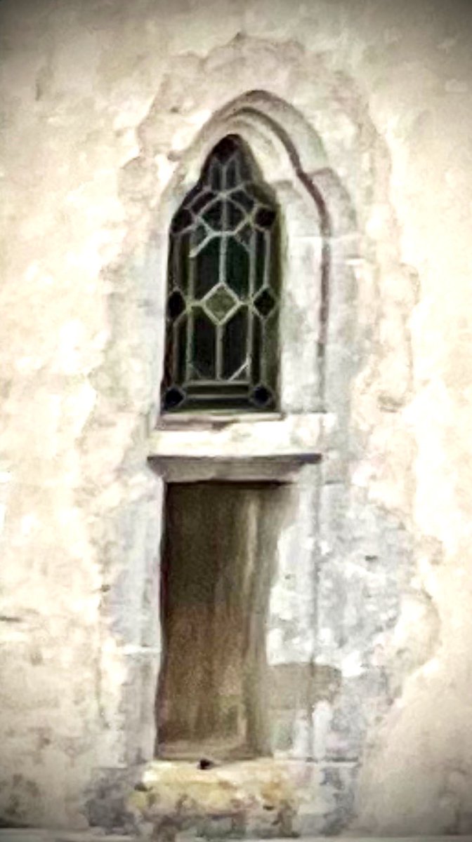 HeritageHiker's tweet photo. Leper’s #Window at the #Church of the Holy Trinity #Marcross with lower boarded wooden ‘door’. 

#valeofglamorgan #newblog #StainedGlassSunday https://t.co/biZ5eoyoDN
