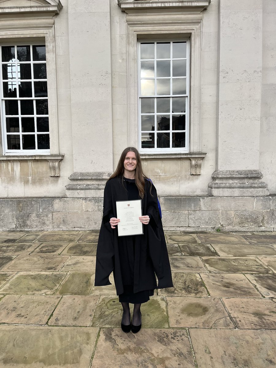 celebrated my phd graduation a few weeks ago! pictured here using my degree certificate to hide my pregnancy! while I’m overjoyed, it’s also been bittersweet for a reason many people (esp. British academics) would do well to care more about: