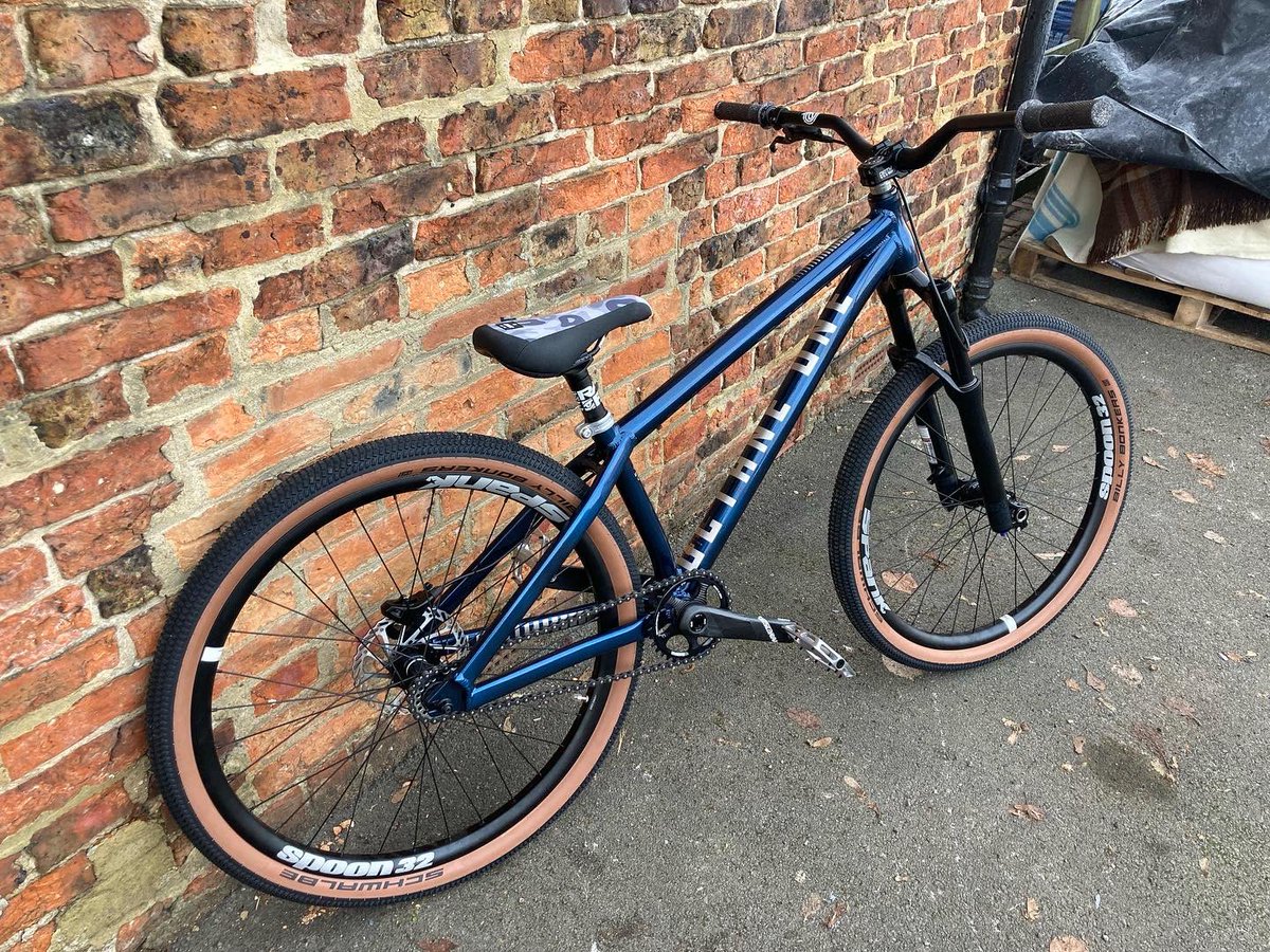 theCYCLEspa's tweet photo. Last bike build out of the workshop for 2022 a bit different from the usual. And no the forks aren’t the wrong way round…… #manitou #octainone https://t.co/87OfsYPuCC