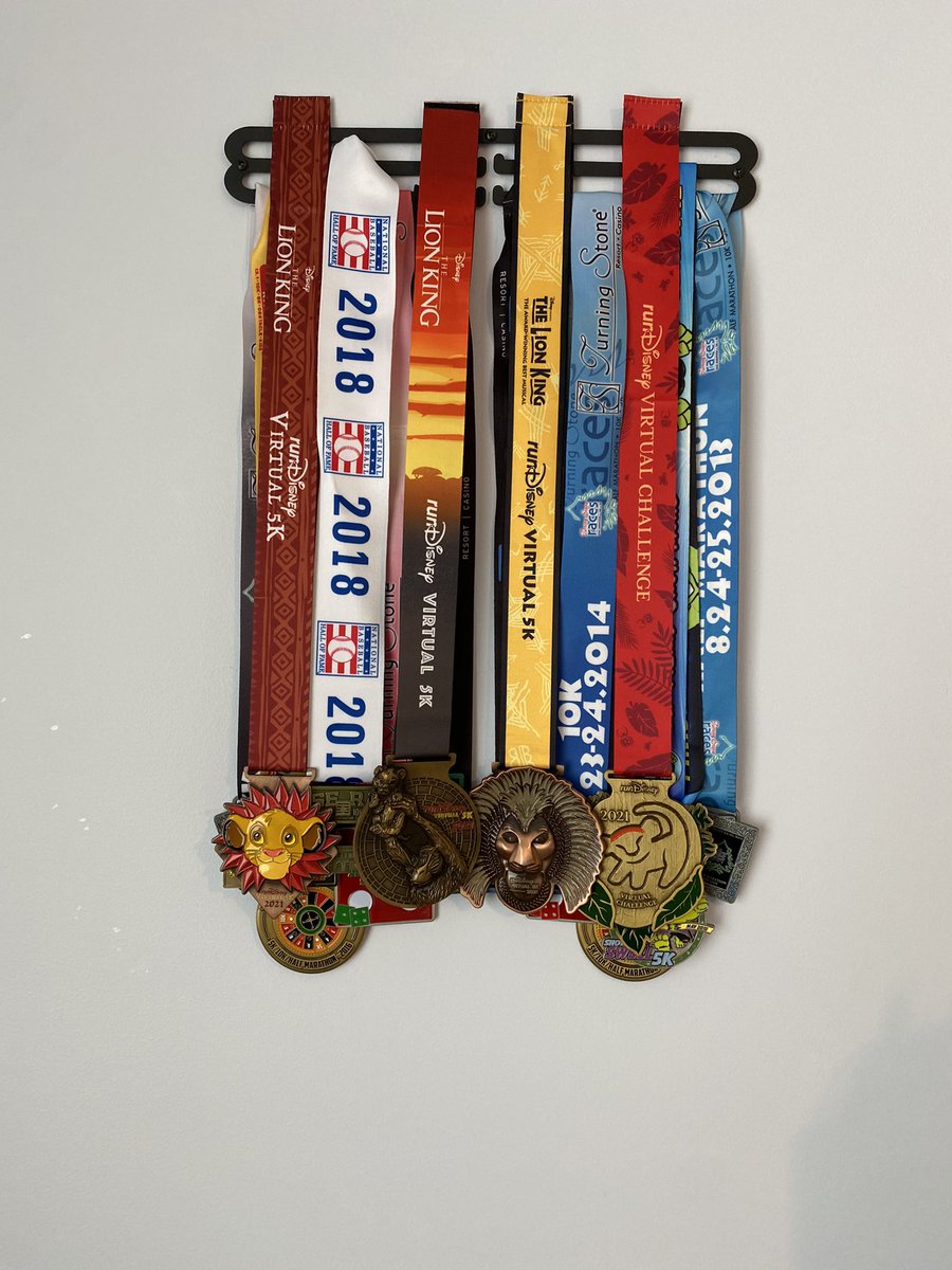 bwbelle13421's tweet photo. I finally got around to hanging up my son’s race medals. Only one was run with someone else pushing him…all the rest were him and i together since 2013. #RhysStrong #specialneedsfamily #5Kfamily https://t.co/eaUMxi1Ytp