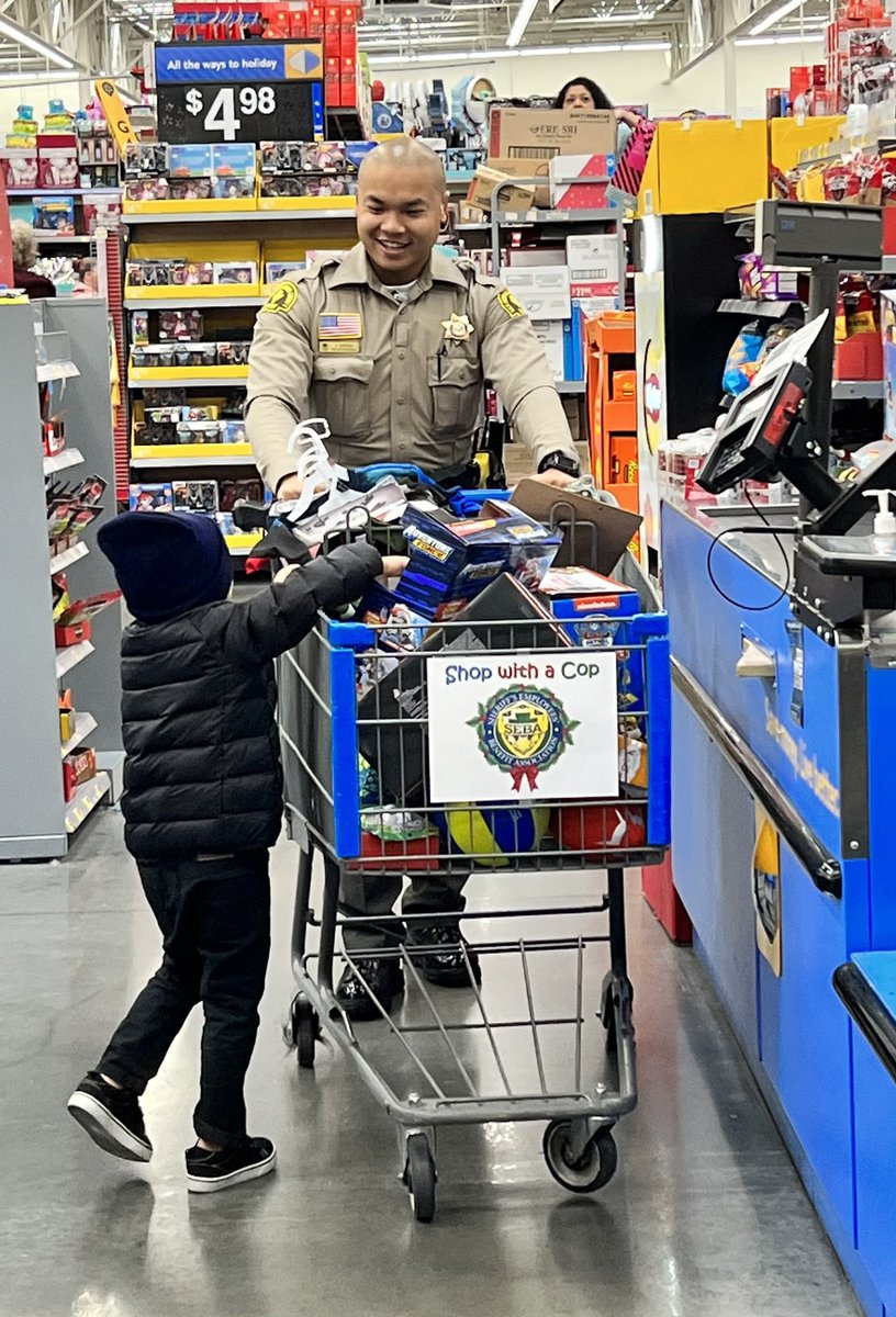 sbcountysheriff's tweet photo. Our High Desert deputies,professional staff, and volunteers were happy to support @sebasbcounty as they hosted their final Shop w/ a Cop at the Victorville @Walmart. Thanks SEBA for sharing some holiday joy with 60 deserving kids! https://t.co/PojpW5lSE7