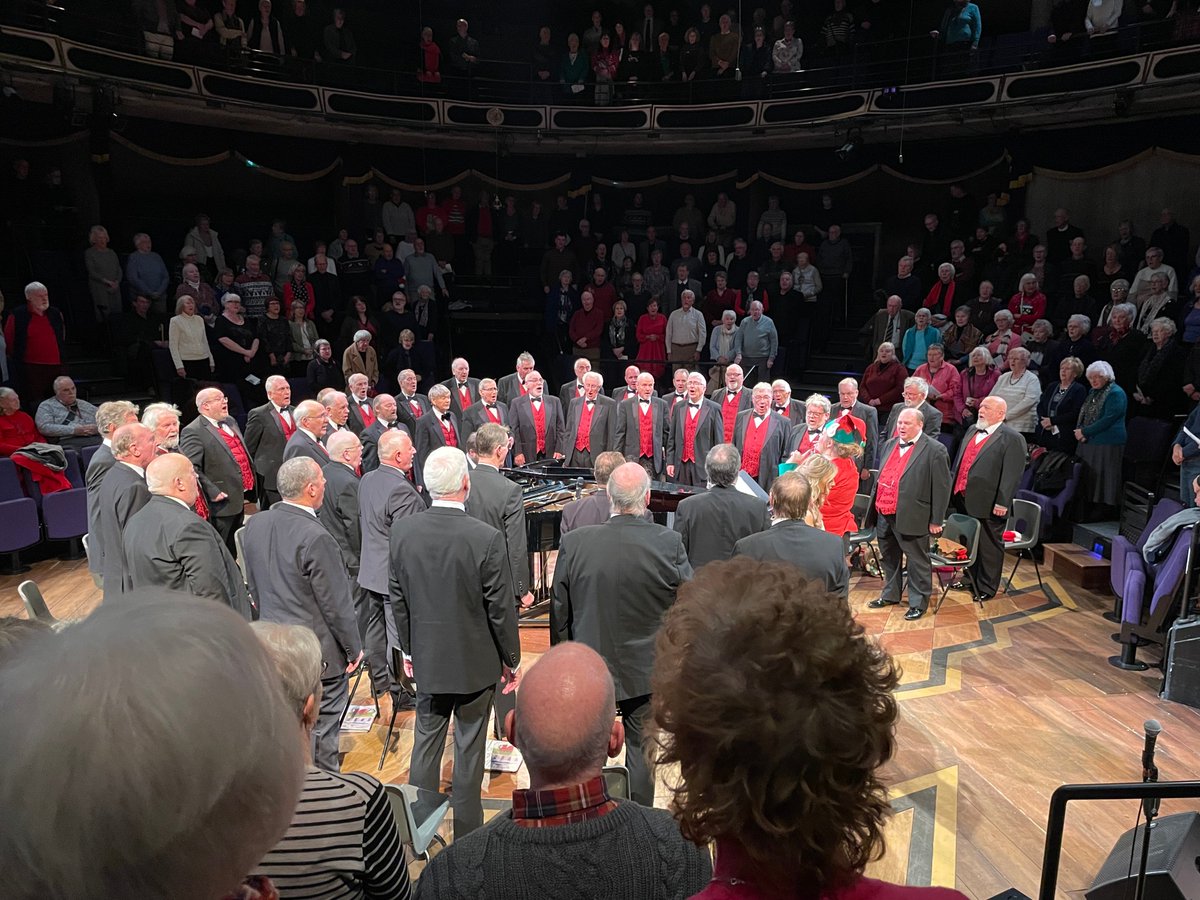 FronMVC's tweet photo. Not only is 2022 the choir’s 75th Anniversary year. It also marks 40 years of our annual Xmas visit to Newcastle-under-Lyme. Saturday (Dec 17), a 500+ audience joined us for our New Vic Xmas concert. @sionedterry was our brilliant guest soloist. #NewVic #FronMVC #MenSinging https://t.co/974S9GjSPE