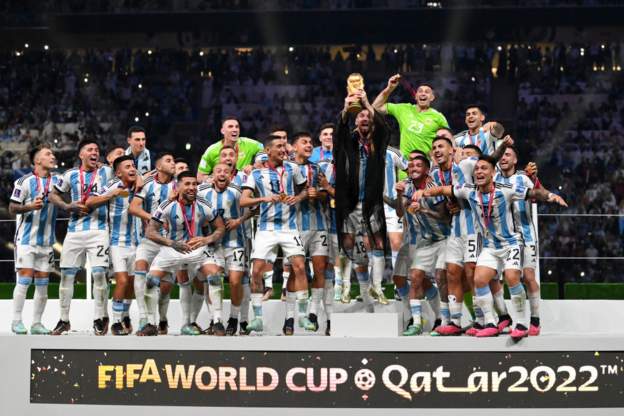 Lionel #Messi rubs his hands together in glee, takes possession of the #WorldCup, gives it a shine and lifts it into the #Qatar sky. #ArgentinaVsFrance