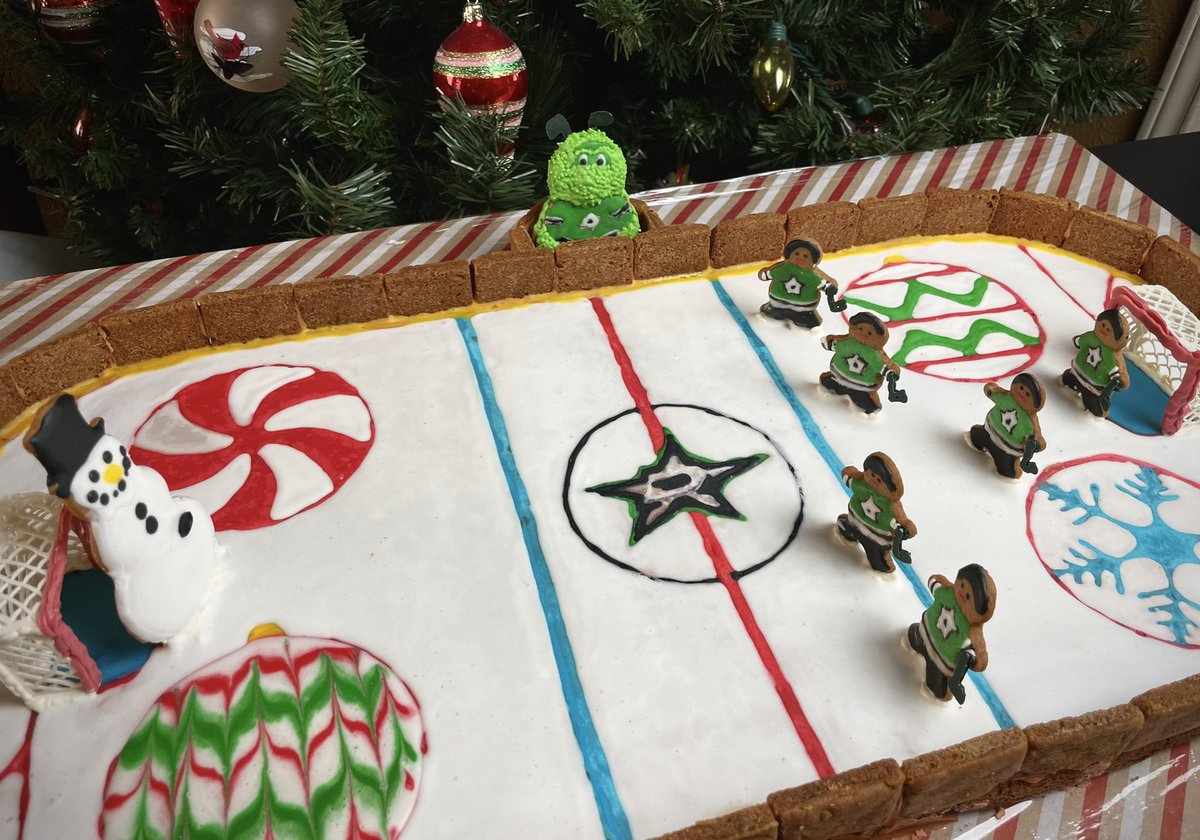 _AmandaKent's tweet photo. I know icing isn’t usually allowed in hockey, but I hope everyone can make an exception in this case! Went with a @DallasStars theme for my gingerbread project this year https://t.co/xjxls8HVac