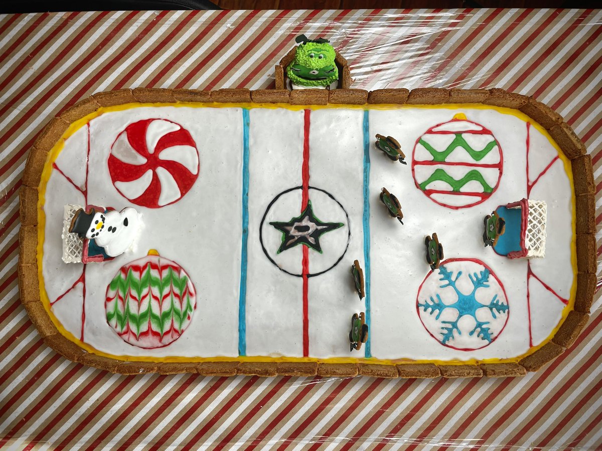 _AmandaKent's tweet photo. I know icing isn’t usually allowed in hockey, but I hope everyone can make an exception in this case! Went with a @DallasStars theme for my gingerbread project this year https://t.co/xjxls8HVac