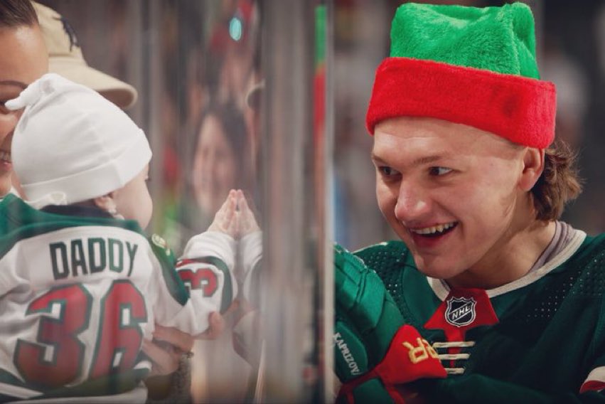 AlexMicheletti's tweet photo. Oh my god, Kirill Kaprizov waving to Mats Zuccarello’s little baby daughter, uncle Kirill ❤️ #mnwild https://t.co/dHEjhuqxr6