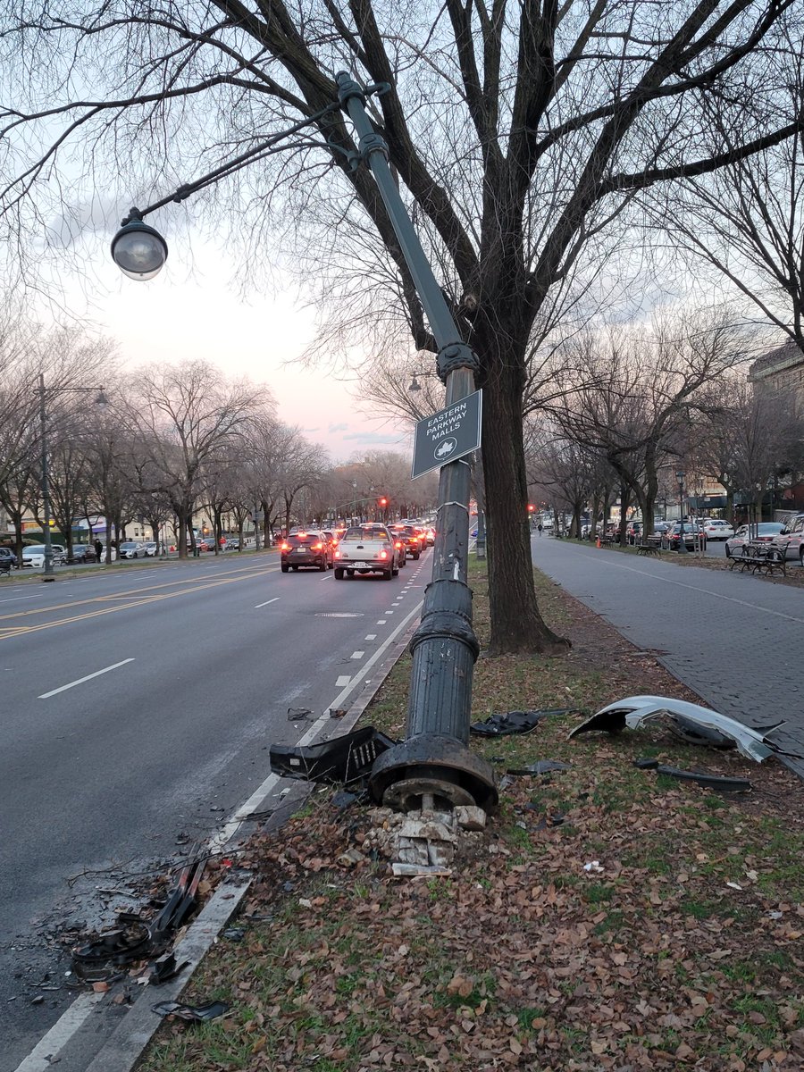 cyclenyc's tweet photo. @nyc311 @NYC_DOT somehow a heavy lamppost like this one hanging over Eastern Parkway looks #dangerous #Brooklyn can you remove it? https://t.co/2HgEfA5GIe