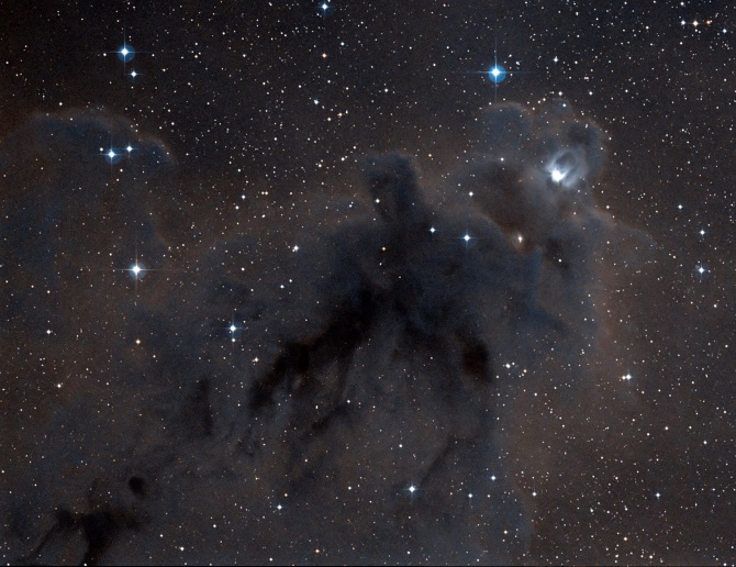 marsrader's tweet image. A dark nebula is an interstellar cloud so dense that it obscures light from objects behind it. This one looks like some kind of wraith.