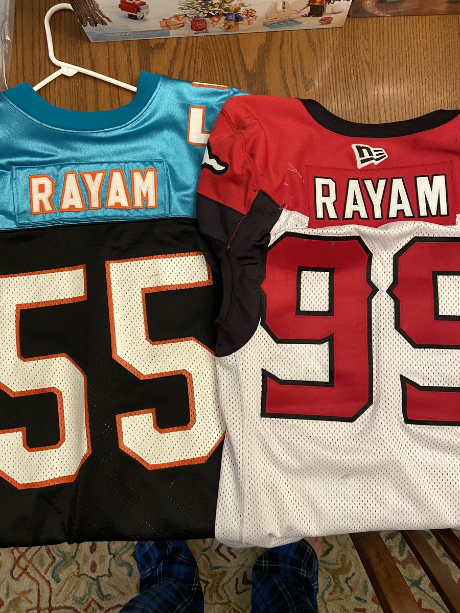 sweetwillytea's tweet photo. Happy to have a father and son combo in my CFL game worn collection. 1995 Birmingham Barracudas Thomas @rayam95 and 2022 @calstampeders T.J. @tj_rayam https://t.co/yCutiuKiYj