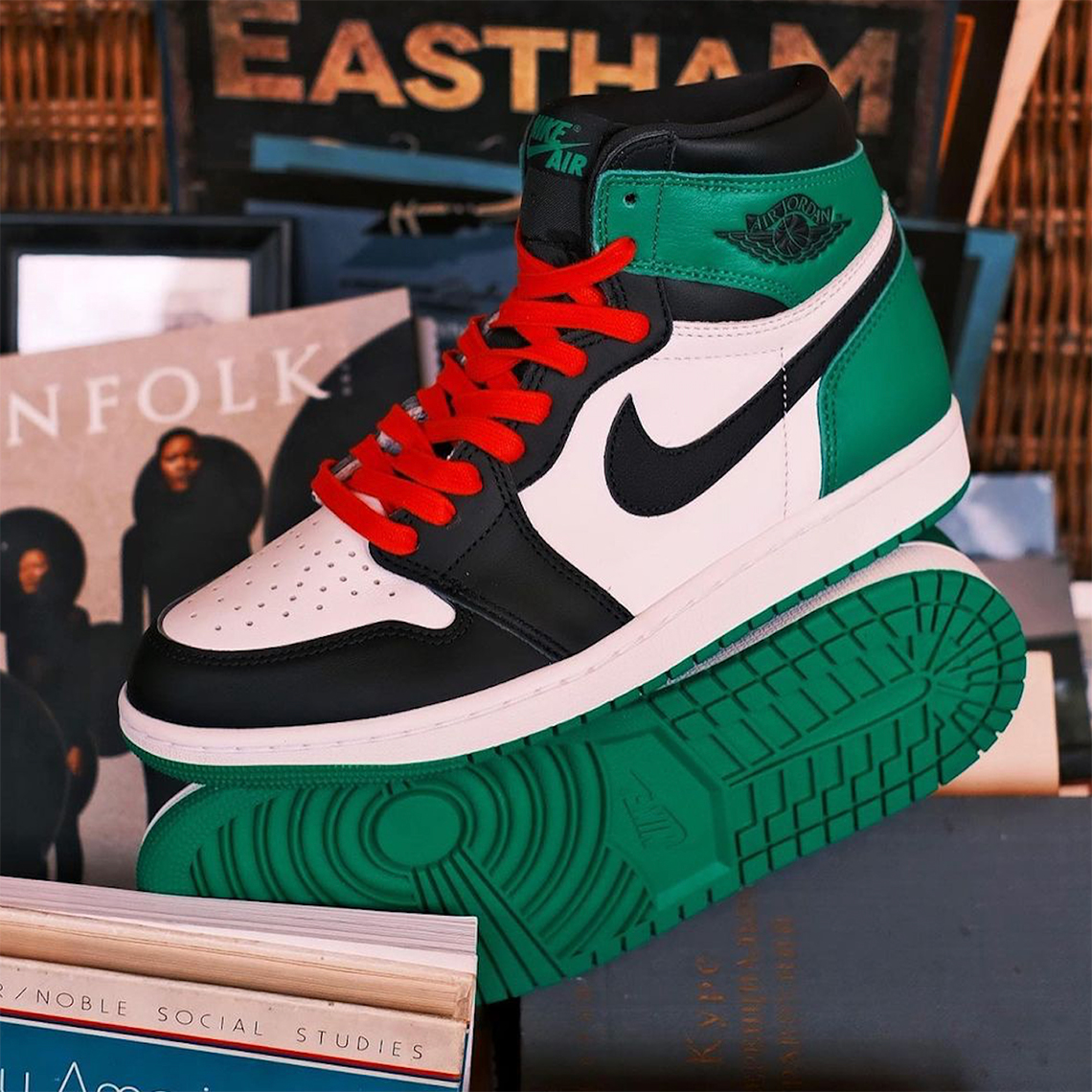 green and black jordan 1 with red laces