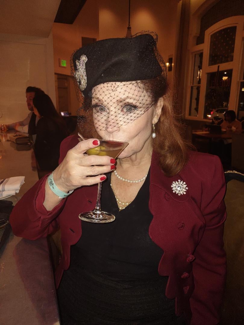 EllenByerrum's tweet photo. I've had that kind of a day. Join me in a virtual drink and some old fashioned noir style. Cheers. #writerslife #retrostyle #veiledhat #subtext https://t.co/kfENRHrUS7