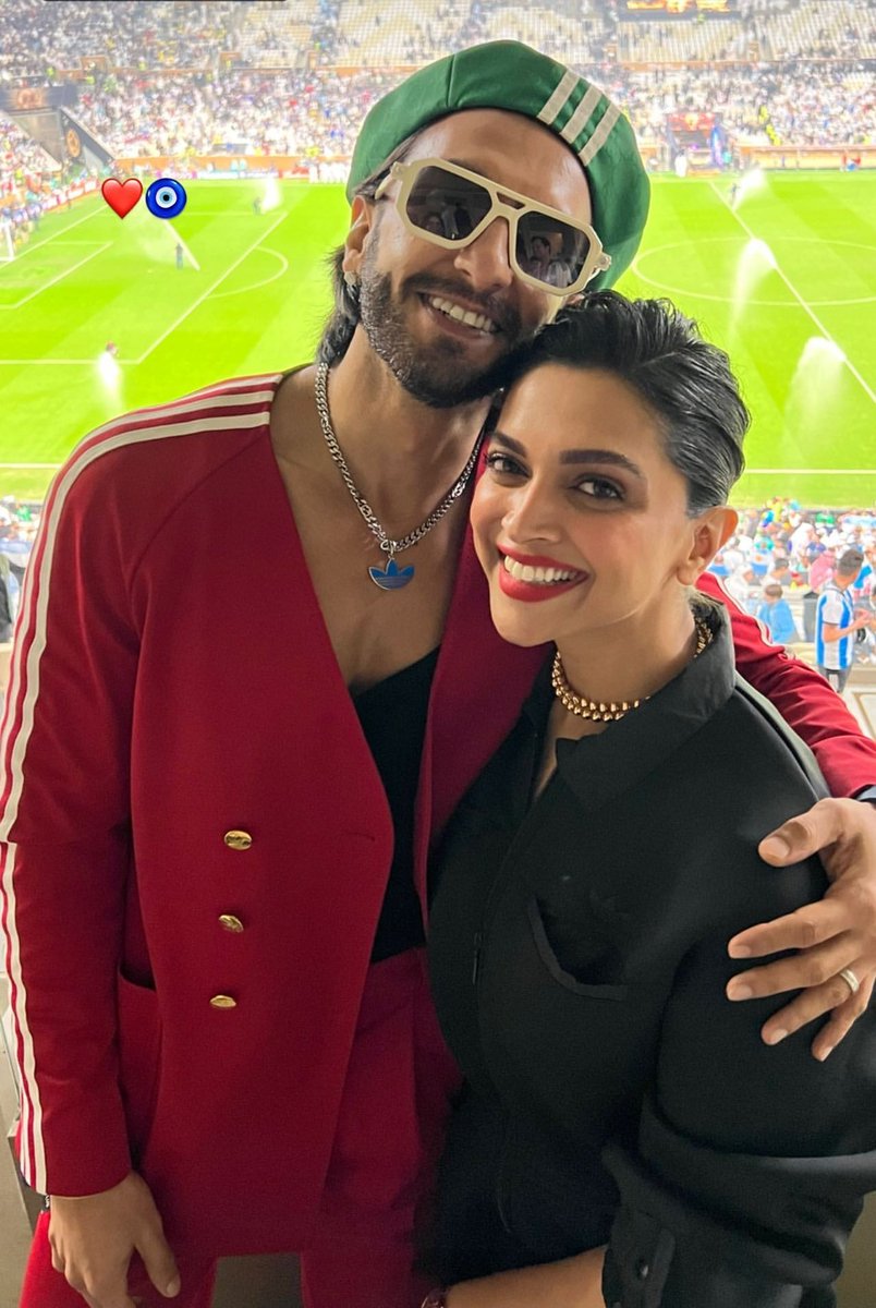 filmfare's tweet photo. "Trophy toh mere haath mein hai," says #RanveerSingh as he shares a pic with #DeepikaPadukone at the #FIFAWorldCup 2022 Finals.⚽️❤ https://t.co/ehmtwLv23Q
