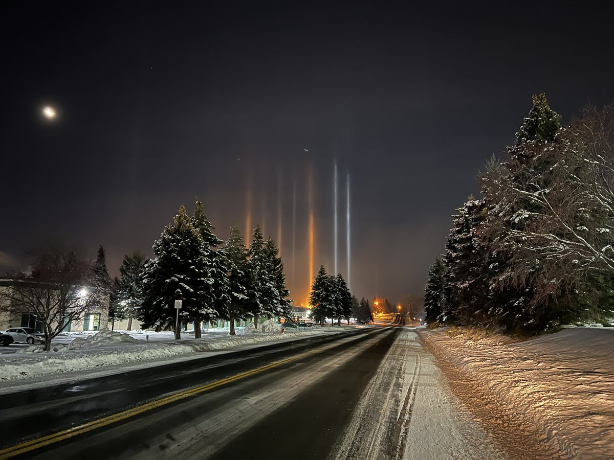 Light pillars briefly visible this morning in Eagan, MN.  Went in search of a another shot and it was over.